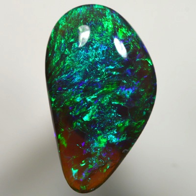 SOLID BLACK CRYSTAL OPAL Sparkling greens and blues, 3 dimensional pattern. SEE VIDEO